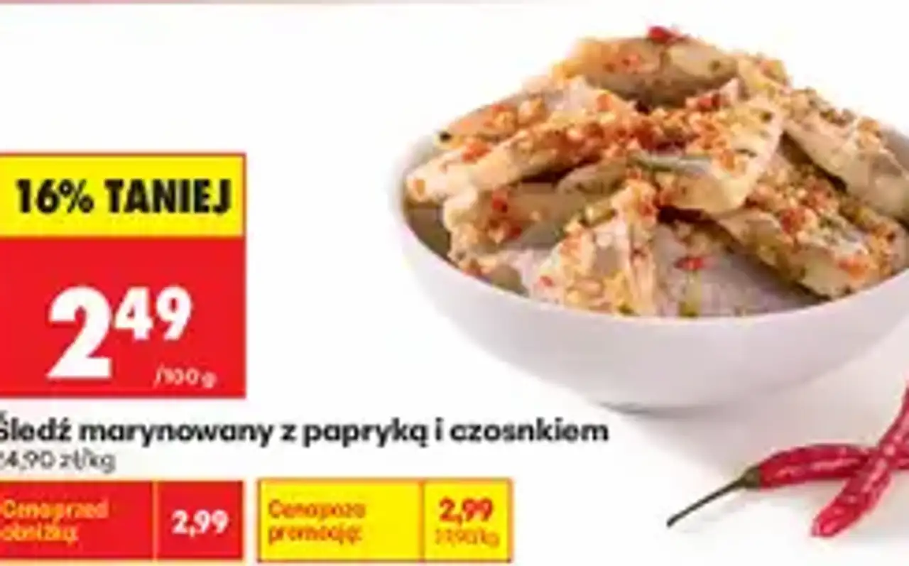 Śledź marynowany z papryką i czosnkiem